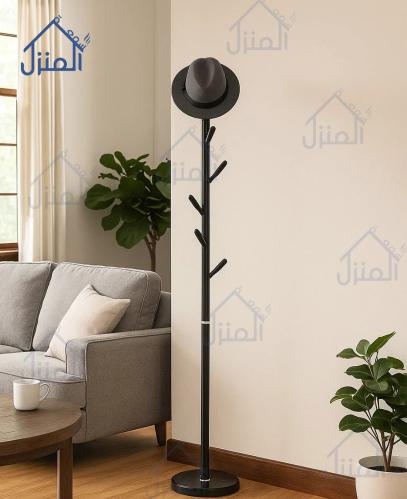 علاقة ملابس أرضية سوداء بتصميم شجري عصري نحيف