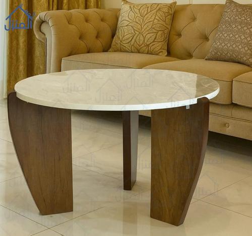 طاولة قهوة دائرية سطح بديل رخام وقاعدة خشب أنيقة
