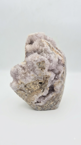 A natural crystal geod masterpiece made of pink am...