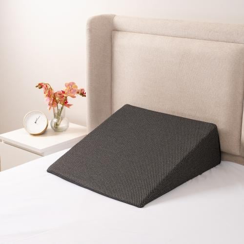 A versatile curved pillow, especially useful for a...