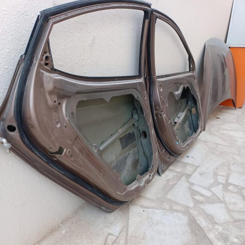 باب السائق وراكب خلفي جهة البسار هونداي النترا 201...