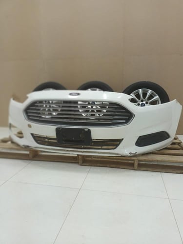 صدام امامي مع الشبك فورد فيوجن 2013 2018