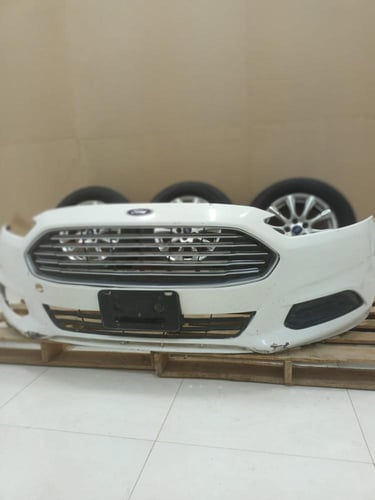 صدام امامي مع الشبك فورد فيوجن 2013 2018