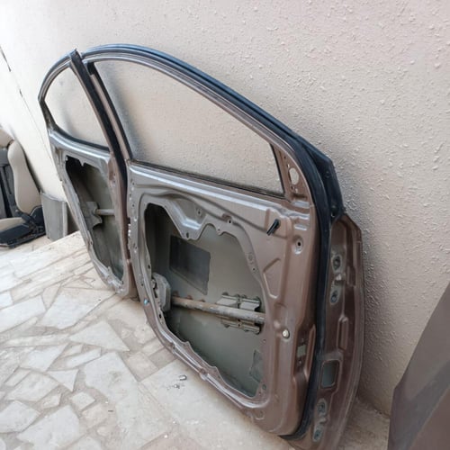 باب السائق وراكب خلفي جهة البسار هونداي النترا 201...