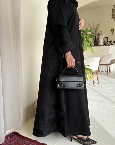 حقيبة جلد اسود