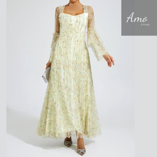 فستان ماكسي لون أصفر مشجر تصميم كلاسيك يظهر جمالك...