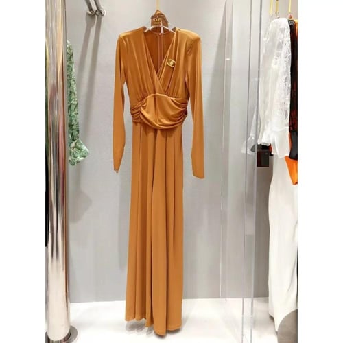 جمبسوت نسائي سهرة سواريه لون كركمي بحزام لف على ال...