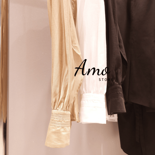 بلوزة انيقة ناعمة بأكمام طويلة ,الياقة بأزرار لؤلؤ...