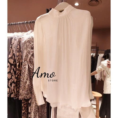 بلوزة انيقة ناعمة بأكمام طويلة مشجرة بأشكال حلزوني...