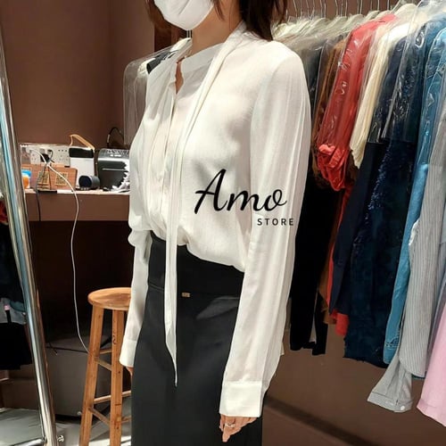 بلوزة بطابع عصري أكمام طويلة بزيادة من الصدر كراف...