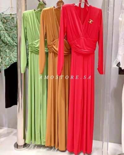 جمبسوت نسائي سهرة سواريه لون أحمر بحزام لف على الخ...