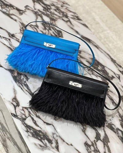 Kelly elan feathers 22cm chevre leather .