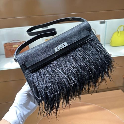 Kelly elan feathers 22cm chevre leather .