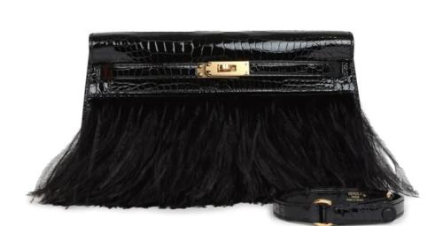 Kelly elan feathers 22cm shiny crocodile leather .