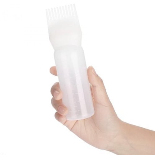 أداة لتوزيع الزيوت و مستحضرات العناية بالشعر.