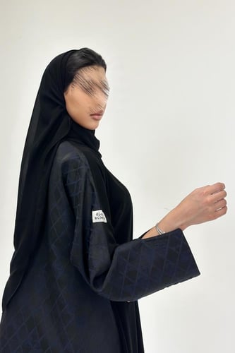 عباية تفتة هندي مع كريب نص كلوش