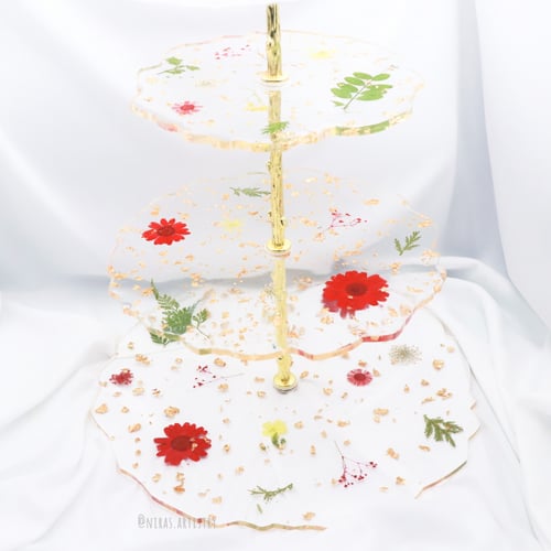 ستناند حلوى بالورد الاحمر