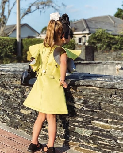 فستان اخضر بكرانيش كبيره بتصميم عصري