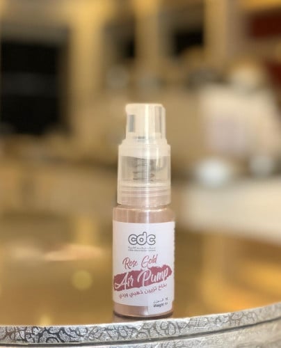 بخاخ بودرة تزيين ذهبي وردي