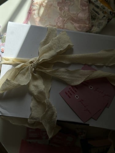 Wrapping the box with a ribbon