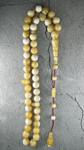 تراب كهرمان أصفر