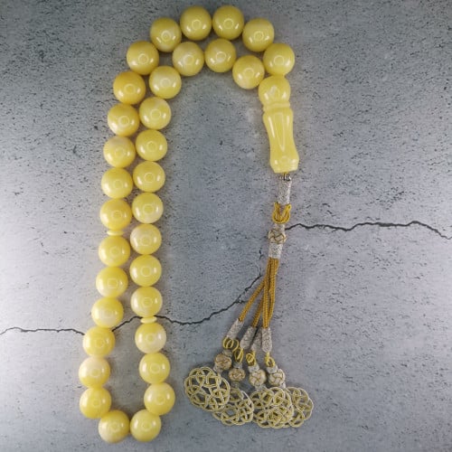 تراب الكهرمان مع طربزونة أصفر رباعي