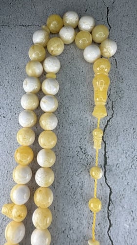 تراب كهرمان أصفر