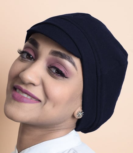 كاب قماش لاكوست من بلاك وينج: الأناقة بكل فخامتها