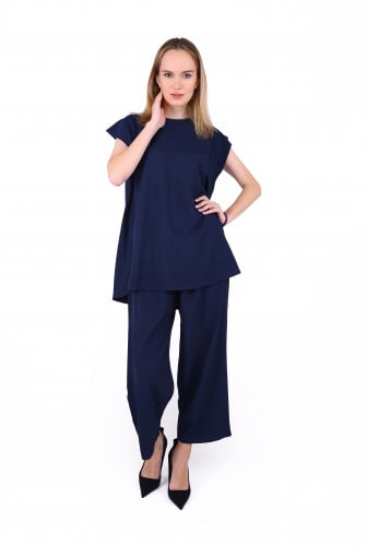 طقم تحت العباية بلوزة وبنطلون كحلي