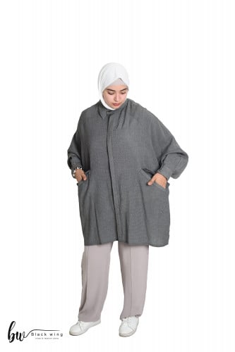 من بلاك وينج بلوزة بقصة واسعة