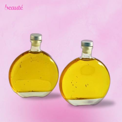 عبوتين من زيت رابونزل لتطويل وتنعيم الشعر