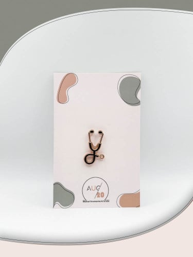 بروش سماعة طبية ذهبي