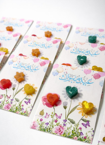 درزن مجوعة توزيعات العيد مستكة ملونة و معطرة بزيوت...