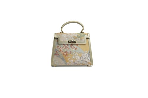 شنطة يد أنيقة متوسطة ذهبية حرير وجلد طبيعي