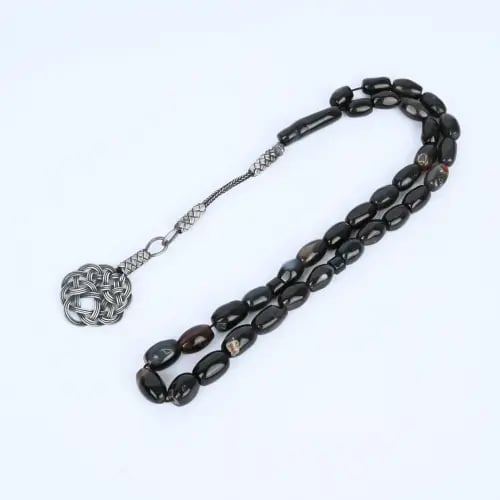 A luxurious Yemeni dark agate prayer bead strand
