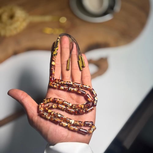 مسباح تراب كهرمان