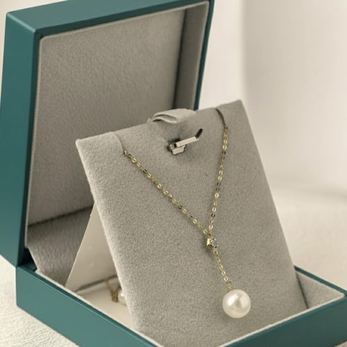 عقد لؤلؤ و الماس تصميم سداسي منسدل بوزن 0.015 قيرا...