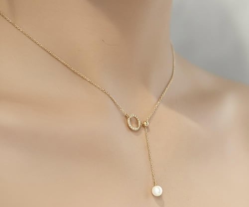 عقد لؤلؤ و الماس تصميم ناعم منسدل بوزن 0.43 قيراط