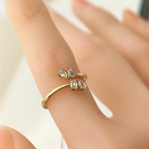 خاتم الماس سوليتير فخم بتصميم متقاطع