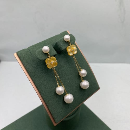 حلق الماس طويل لؤلؤ على حجر الاوبال الاصفر بوزن 0....