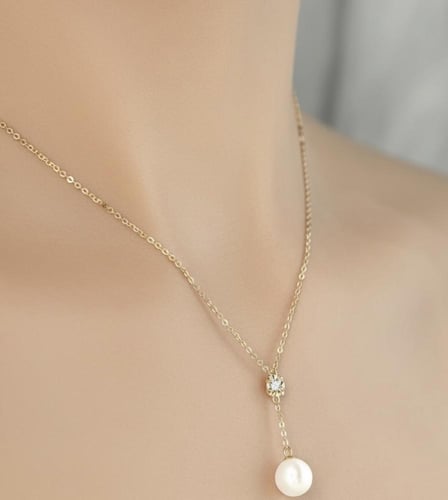 عقد لؤلؤ و الماس روز قولد تصميم منسدل بوزن 0.015 ق...