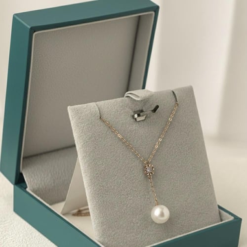 عقد لؤلؤ و الماس روز قولد تصميم منسدل بوزن 0.015 ق...