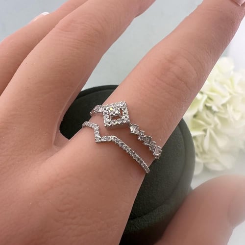 خاتم ألماس هندسي ذهب أبيض بفصوص باغيت ودائرية