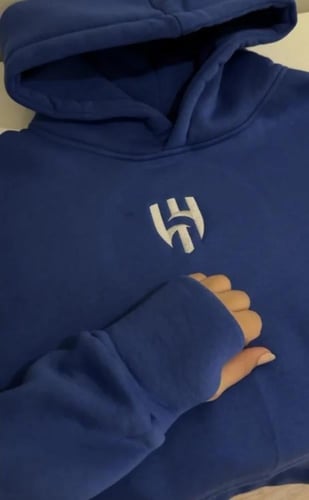 سويتر الهلال مع فتحه ابهام