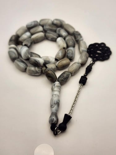 سبحه رماديه بطربزونه 33 خرزه قص برميلي 13.5 طول 8....