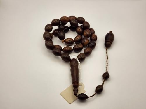 سبحه من خشب الكوك 33 خرزه قص زيتوني 13 طول 9 عرض