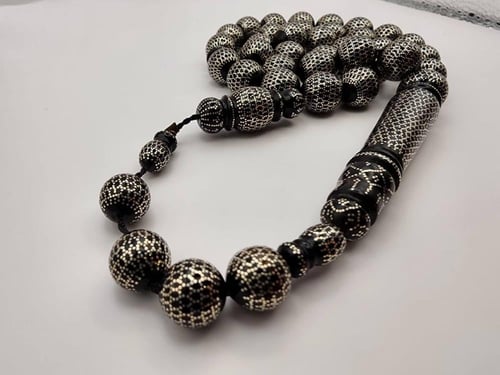 سبحه يسر مطعمه بالفضه قص دائري