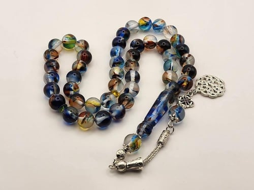 سبحه بكالايت 10 ملي 45 خرزه باللون الشفاف المموج