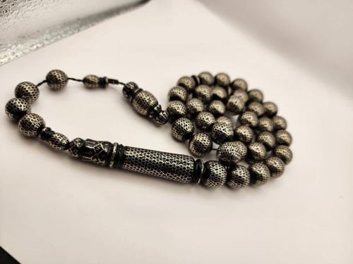 سبحه يسر مطعمه بالفضه قص دائري