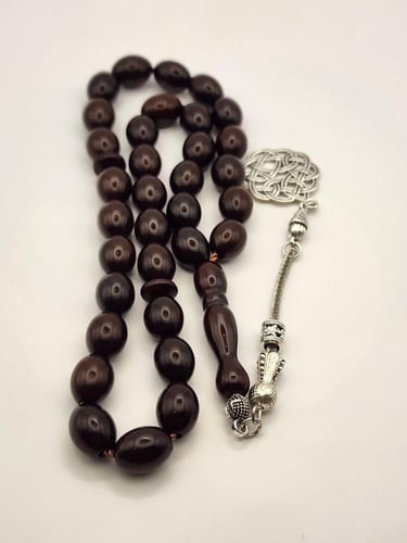 سبحه عوديه بطربزونه 33 خرزه قص زيتوني 12 طول 9.5 ع...